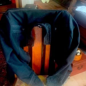 Black coat with nice details, almost military look,